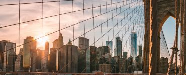 J1 Researcher in New York skyline